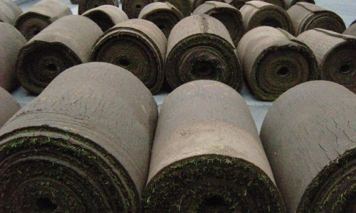 Rolled up strips of turf in Trafalgar Square